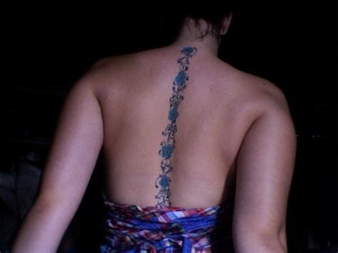 Order # size # of decals on sheet sheet price 11914c/75 2 1/2 x 2 12 $ 7.5… exquisite turquoise blue pale and yellow petals of spring flowers forget me not are traditional patterns for tattooing. Tattoo Designs for Spine | Find a Tattoo Blog