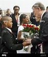 Children present German President Horst Koehler (R) and his wife Eva ...