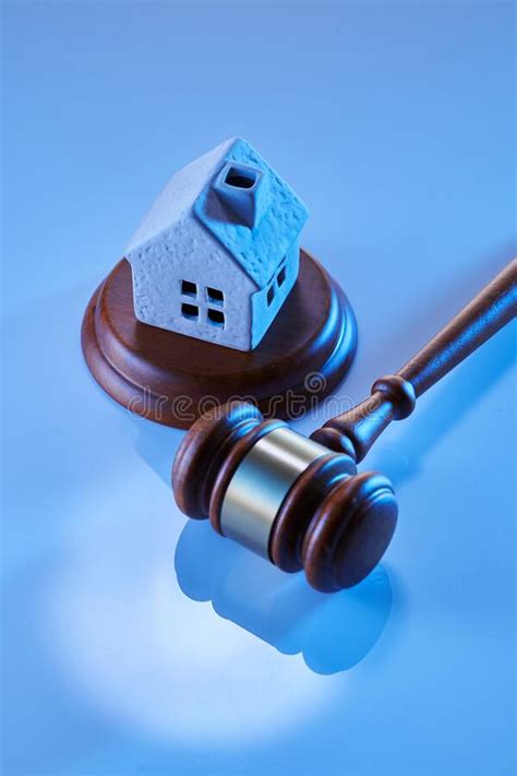 Auction Process Gavel Wooden And Modal House Vertical Stock Photo