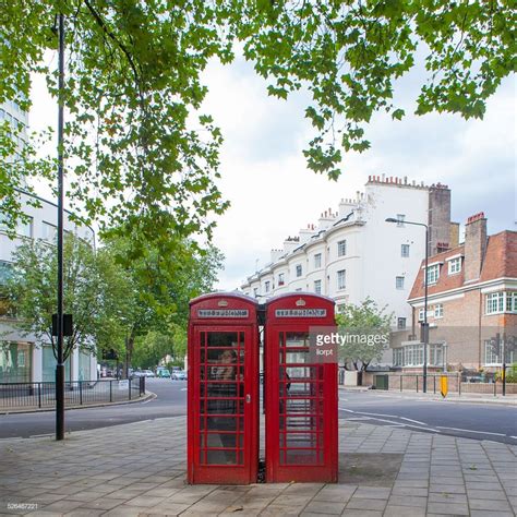 Stock Photo Two Typical Red Phone Booths In A London Street Red