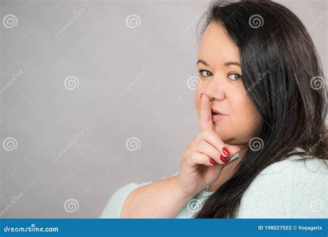 Woman Asking For Silence With Finger On Lips Stock Photo Image Of