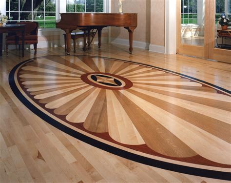A Grand Piano Sits In The Center Of A Room With Hardwood Floors And