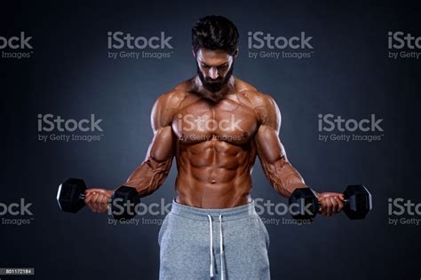 Muscular Men Exercise With Weights Stock Photo Download Image Now