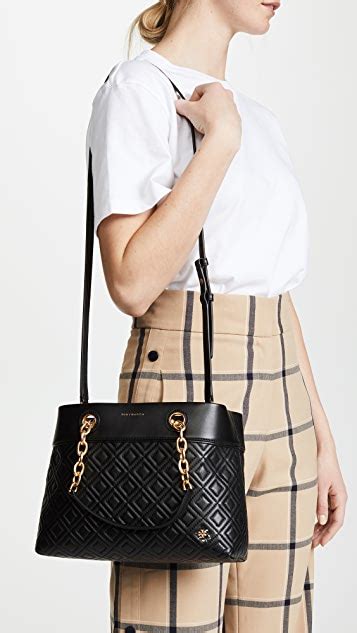 It?s the understated and simple elegance of this bag. Tory Burch Fleming Small Tote | SHOPBOP
