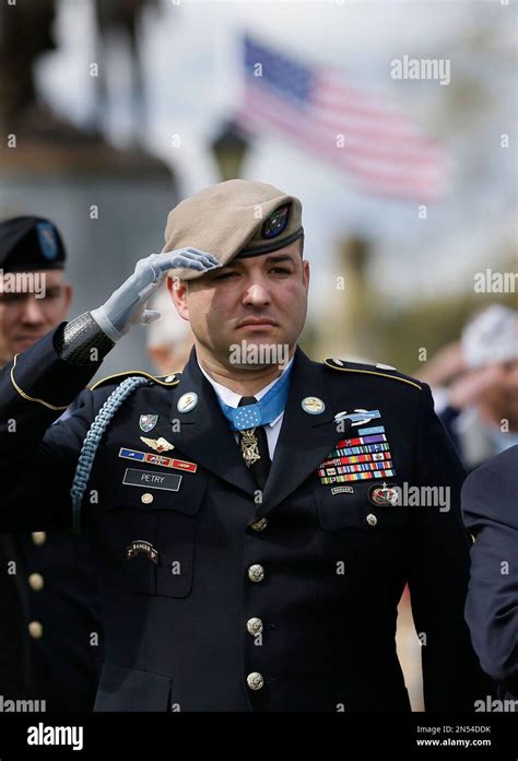 Medal Of Honor Recipient Sgt 1st Class Leroy Petry Stands And Salutes
