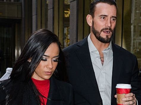 wwe mentions cm punk s wife aj lee amidst ugly war with aew essentiallysports