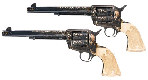 Two Engraved Gold Inlaid Colt Revolvers A Engraved Gold Inlaid Colt
