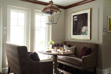 Blue stripe french settee with caster legs features various accent pillows atop a red and gray kilim rug layered over a chevron jute rug in a transitional living room. Dining Settee Bench - Transitional - dining room - Liz ...