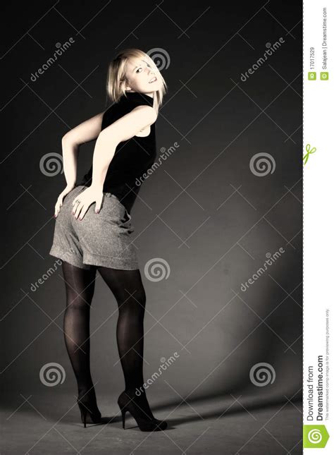 Provocative Blonde Woman In Red Dress Posing Near Her Lover Stock Image Cartoondealer Com