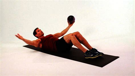 How To Do One Arm Alternating Sit Ups With A Medicine Ball Howcast