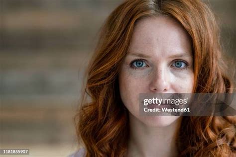 redhead freckles woman photos and premium high res pictures getty images