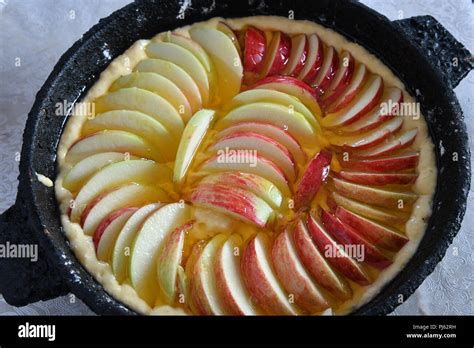 A Raw Apple Pie With Honey Stock Photo Alamy