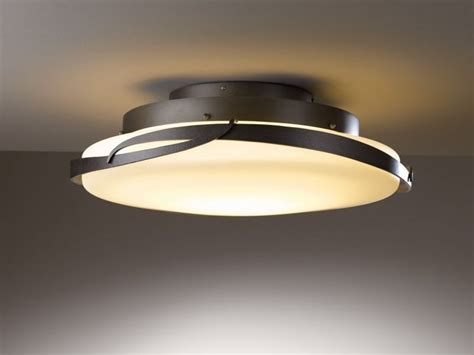 Providing an uplight for increased illumination in a classic. Hubbardton Forge Flora Ceiling Light - Rustic Lighting & Fans