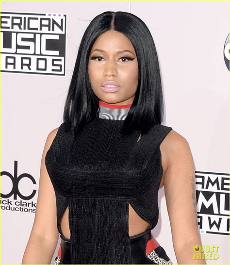 Nicki Minaj Brings Her Signature Sass To Amas Red Carpet Photo