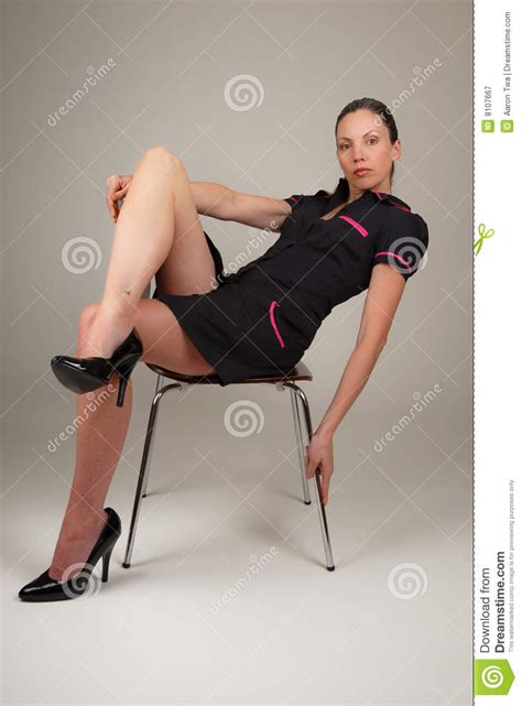 Free for commercial use no attribution required high quality images. Woman Sitting On Modern Chair Stock Image - Image of heels ...