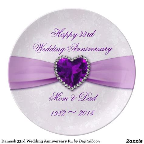 A Wedding Anniversary Plate With A Purple Heart