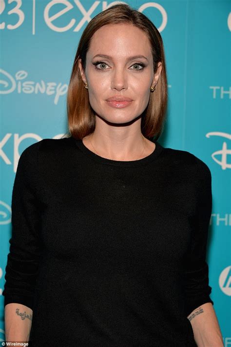 Angelina Jolie Shows Off Her Slimline Figure In Cigarette Pants And A