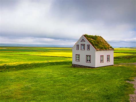 House In Iceland With Grass On Its Roof By Piet Van De Wiel
