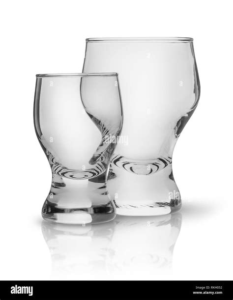 two glasses side by side big and small glasses one after another isolated on white background