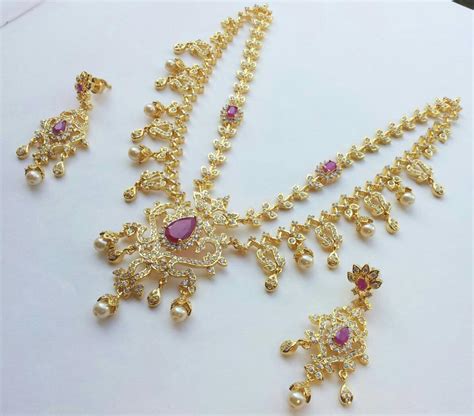 Jewellery Designs Polki Diamond Set With Studded Rubies