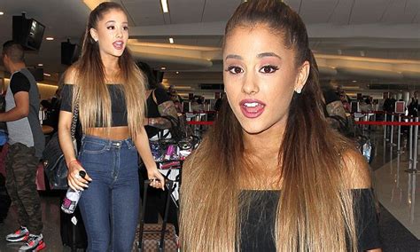 ariana grande says nude photos are fake after being nominated for six emas daily mail online