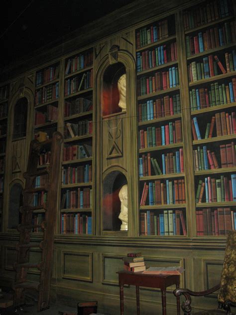An Old Library Filled With Lots Of Books
