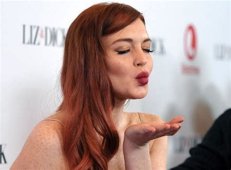 lindsay lohan charged in assault in new york city club newspaper reports