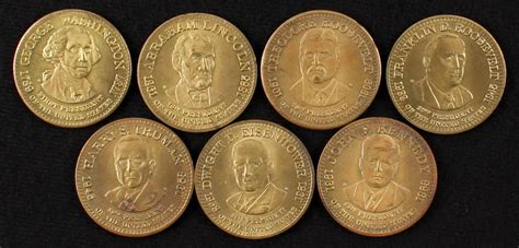 An object made to commemorate a person, mark an event, etc. Set of (7) Presidential Commemorative Coins | Pristine Auction