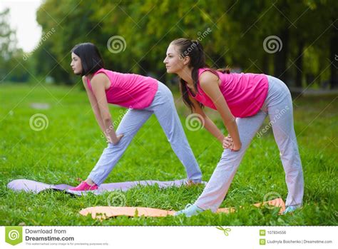 Two Young Woman Doing Gymnastic Exercises Outdoor Stock Photo Image