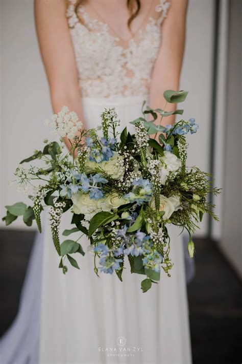 Royal blue and white wedding. veronicas, light blue delphiniums, eucalyptus, roses ...