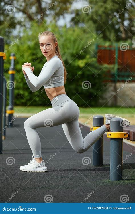 Active Lifestyle Slim Blond Woman Working Out In Outdoor Gym At Summer Warm Day Stock Image