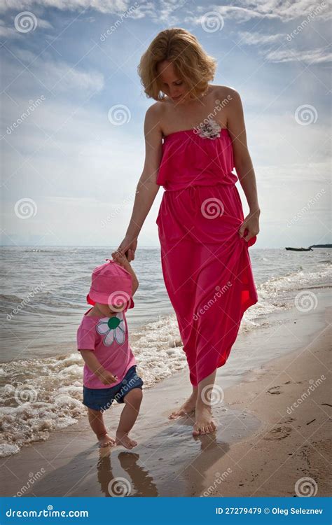 Mother With Her Baby Having Fun On The Beach Stock Image Image Of