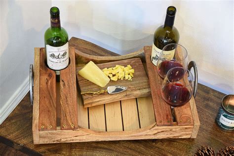 Using slabs of reclaimed wood is a popular way to store a few bottles of wine in an attractive way. Pin on Pallet Wine Racks