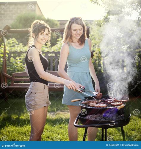 Two Pretty Girls Making Food On Grill Stock Image Image Of Grilling