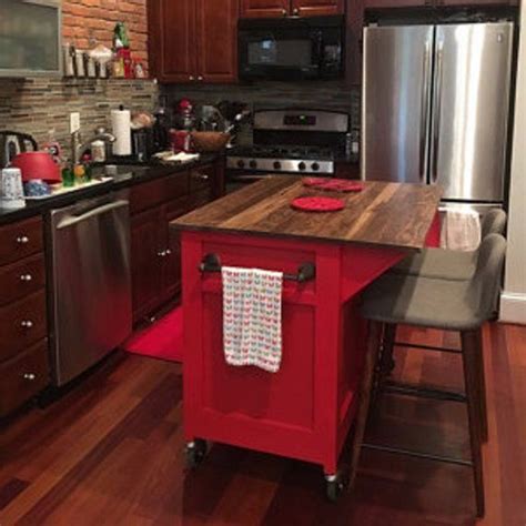 The kitchen island is made of a combination of solid wood legs and framing, as well as wood veneer to provide the bold structures all around. Customize and buy it now at hickorygrovehomegoods.com ...