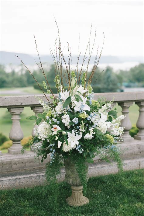 Outdoor Wedding Ceremony Large Floral Arrangements Of White Green