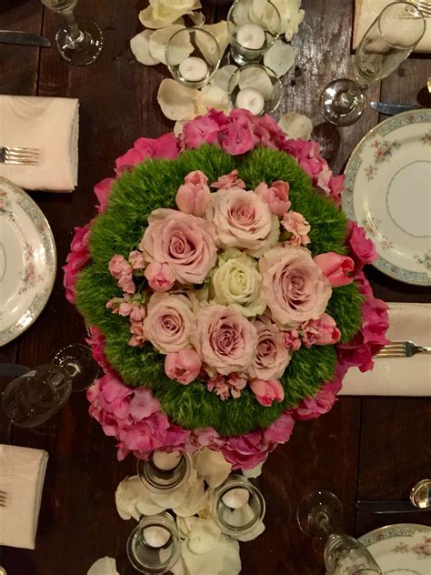 Bud vases a grouping of bud vases with small florals can fill the same amount of space as a larger arrangement—but it requires fewer blooms. Rehearsal dinner centerpiece | Dinner centerpieces ...