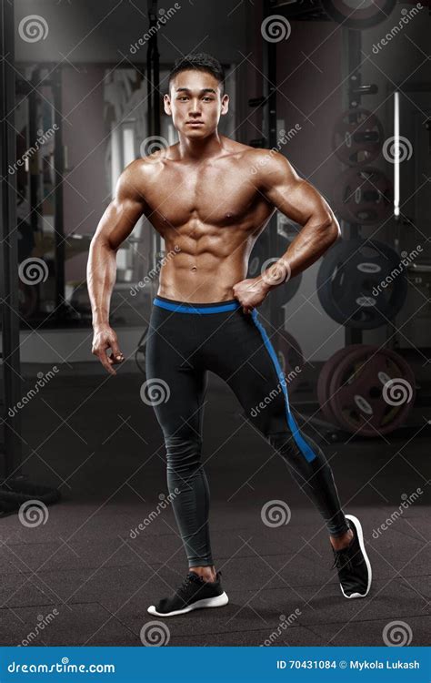 Asian Muscular Man Posing In Gym Shaped Abdominal Strong Male Naked Torso Abs Working Out