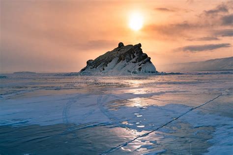Sunset Over Frozen Water Lake Baikal Russia Winter Season Stock Photo