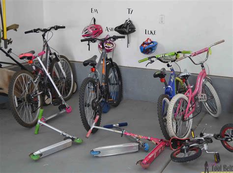 This wall mount bike rack is a great way to store and display your bike. DIY Bike and Scooter Rack - Her Tool Belt