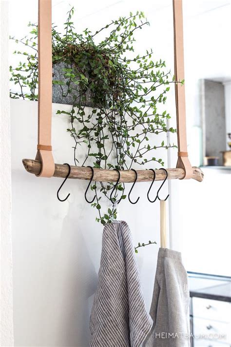 Mark exactly where the nail goes and hang picture f. DIY Hangers That Are Simply Amazing
