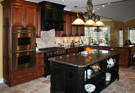 Decorating kitchen with distressed black kitchen cabinets are the right way to create timeless beauty and rustic atmosphere for this kitchen. Cherry cabinets kitchen, Tuscan kitchen, Kitchen cupboard ...