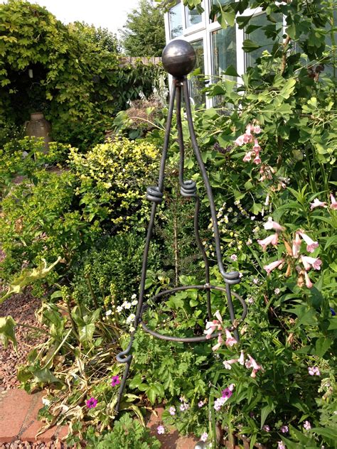 Browse our garden décor range and brighten up any outdoor space with garden ornaments, metal sculptures, lanterns, solar festoon lights and more. Metal Art Plant Supports - Home (With images) | Metal art ...