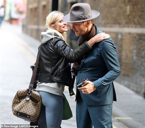 nadiya bychkova and matt goss embrace as they head to rehearsals for strictly come dancing