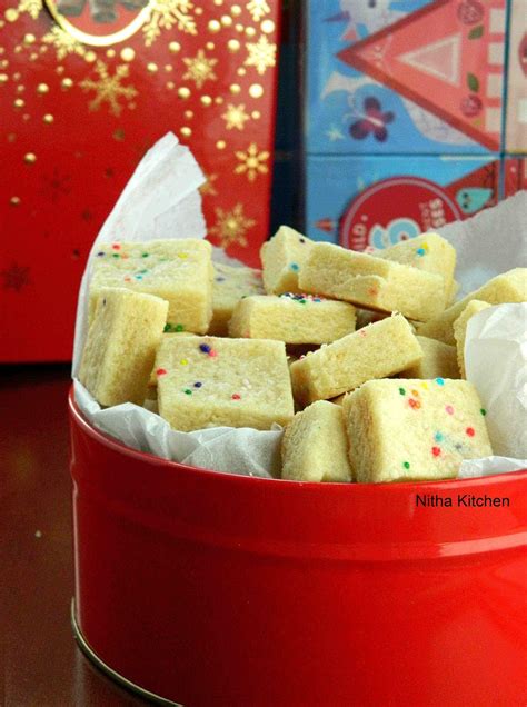 Carefully transfer the cookies to the lined baking sheets, laying them with a bit of space in between, and decorate them generously with sprinkles. Christmas Shortbread Bites | Eggless Funfetti Shortbread ...