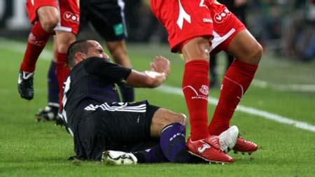 This is a game in which the players hit a small white ball into holes in the ground with a set of clubs using as few hits as possible. World's Worst Football Sports injuries-Soccer injury ever