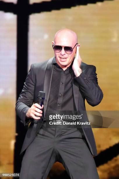 Pitbull Rapper Photos And Premium High Res Pictures Getty Images