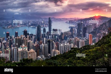 Hong Kong Skyline At Dramatic Sunrise Victoria Harbour Stock Photo Alamy