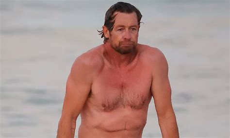 Shirtless Simon Baker 52 Looks Freezing As He Goes For A Swim And