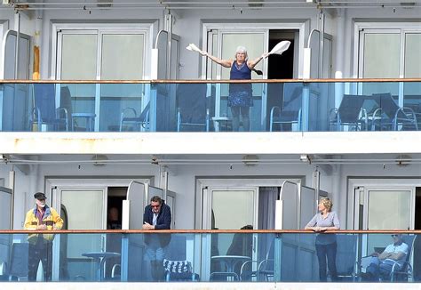 Woman Hangs Off Balcony On Cruise Ship Image Balcony And Attic